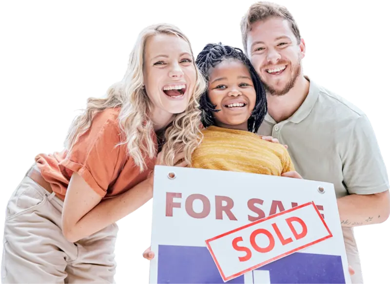 Smiling family holding a For Sale sign marked Sold